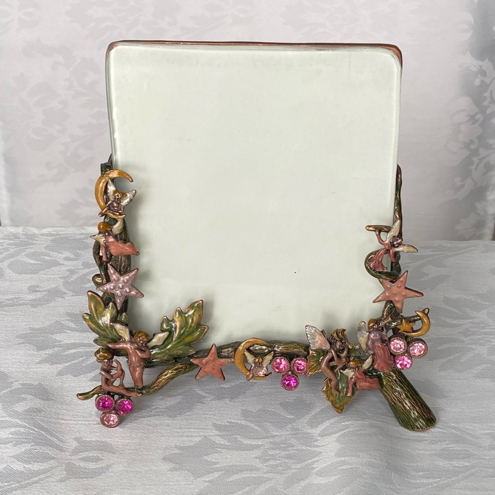 Unique metal picture frame with stars, moons and angel decor